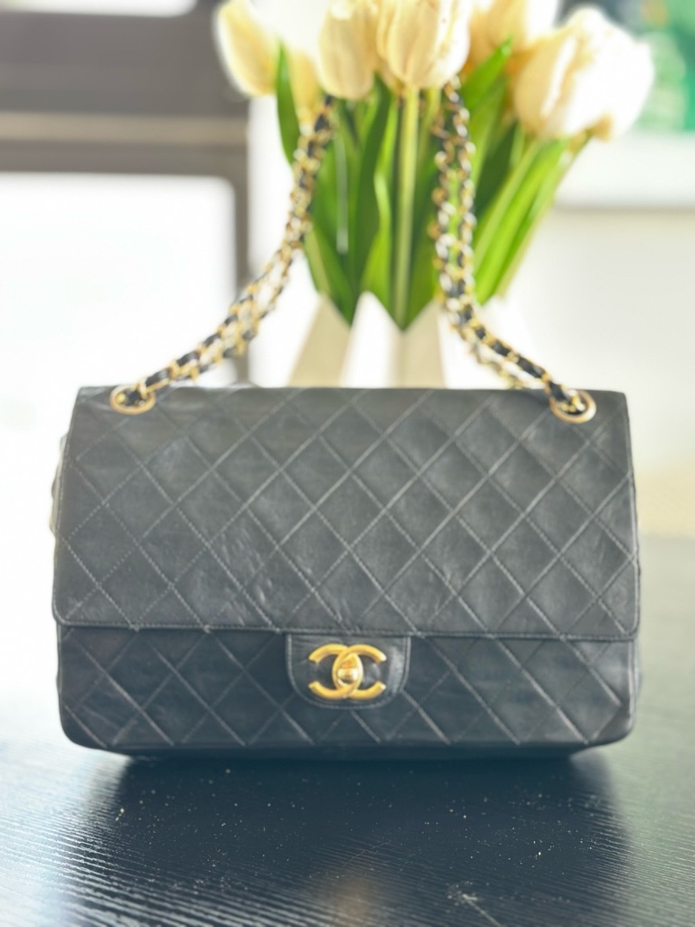 CHANEL Black Quilted Leather Shoulder Bag with Gold Hardware